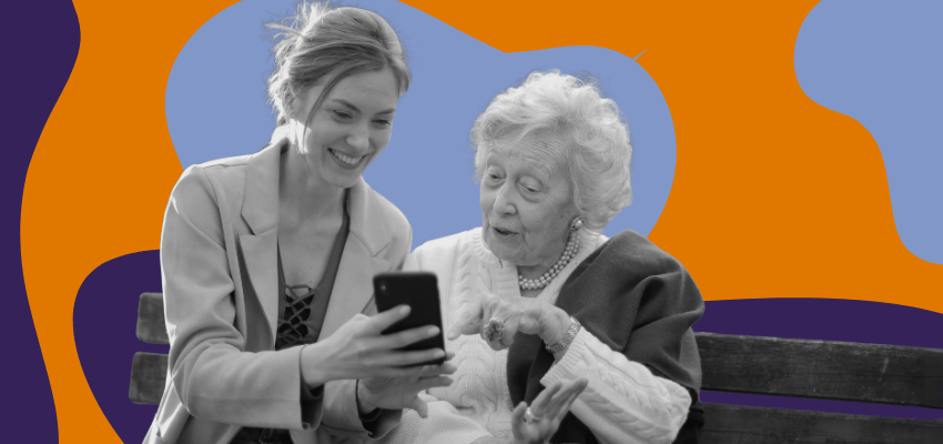 A caregiver shows their family member a home health or hospice industry website.