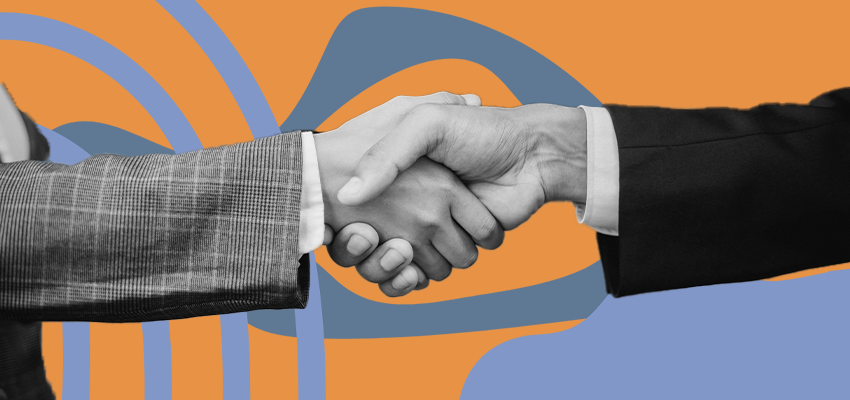 A home health consultant and agency owner shake hands.